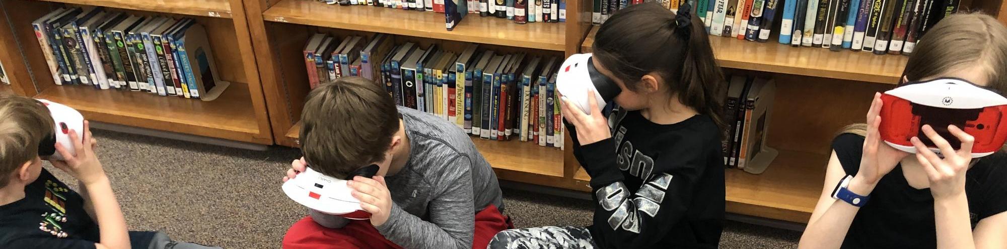 kids using virtual reality googles